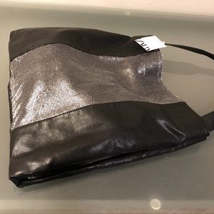 Large handbag with metal detail in front